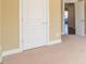 Bright bedroom with neutral walls, carpet, and white trim at 335 Roberts Run Cv, Suwanee, GA 30024