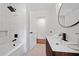 Modern bathroom featuring a stylish vanity, sleek fixtures, and a shower-tub combo with unique tile at 3964 Gretna Green Dr, Decatur, GA 30035
