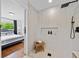 Gorgeous glass walk-in shower off the main bedroom with rain shower fixture and built-in niche at 3964 Gretna Green Dr, Decatur, GA 30035