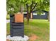 Exterior view of the house number next to the front yard and mailbox at 3964 Gretna Green Dr, Decatur, GA 30035