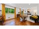 Inviting living room featuring hardwood floors, a cozy fireplace, and large windows offering outdoor views at 3964 Gretna Green Dr, Decatur, GA 30035