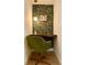 Charming small office nook with floral wallpaper, sleek desk, and modern green chair, perfect for a home office at 3964 Gretna Green Dr, Decatur, GA 30035