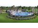 Community pool area surrounded by a flower bed, black fencing, and comfortable lounge chairs for relaxing at 4125 Sierra Vista Cir, Cumming, GA 30040