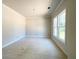 Unfinished room with large windows and white trim at 4125 Sierra Vista Cir, Cumming, GA 30040