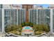 Stunning aerial view of the condo complex with pool, clubhouse, and lush landscaping, perfect for luxurious living at 44 Peachtree Ne Pl # 1929, Atlanta, GA 30309