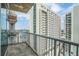 Balcony with cityscape view from a high rise apartment, overlooking nearby buildings at 44 Peachtree Ne Pl # 1929, Atlanta, GA 30309