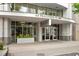 Exterior shot of 44 Peachtree with a covered entryway and attractive signage at 44 Peachtree Ne Pl # 1929, Atlanta, GA 30309