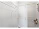 Bright walk-in closet with white wire shelving, providing ample storage and organization solutions at 44 Peachtree Ne Pl # 1929, Atlanta, GA 30309