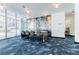 Bright conference room with floor-to-ceiling windows and a large table for meetings and collaboration at 44 Peachtree Ne Pl # 1929, Atlanta, GA 30309