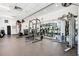 Well-equipped gym with weight machines, free weights, and mirrored walls for a complete workout experience at 44 Peachtree Ne Pl # 1929, Atlanta, GA 30309
