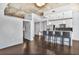 Open-concept living area boasting hardwood floors, stainless appliances and great lighting at 44 Peachtree Ne Pl # 1929, Atlanta, GA 30309