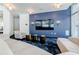 Comfortable lounge area features contemporary furnishings, a large-screen TV, and stylish decor at 44 Peachtree Ne Pl # 1929, Atlanta, GA 30309