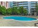 Outdoor swimming pool surrounded by lounge chairs, creating a refreshing and relaxing oasis at 44 Peachtree Ne Pl # 1929, Atlanta, GA 30309
