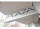 Signage for The Plaza Midtown, indicating a sophisticated urban residential experience at 44 Peachtree Ne Pl # 1929, Atlanta, GA 30309