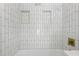 Updated bathroom boasts a shower with built-in niches and new fixtures at 605 Patrick Ne Pl, Sandy Springs, GA 30328