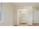 This bedroom features a large walk-in closet with plenty of storage space and shelving at 605 Patrick Ne Pl, Sandy Springs, GA 30328