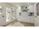 Dining area featuring built-in cabinets and large windows at 605 Patrick Ne Pl, Sandy Springs, GA 30328