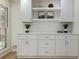 Dining area featuring built-in cabinets and floating shelves at 605 Patrick Ne Pl, Sandy Springs, GA 30328