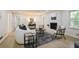 Comfortable living room with fireplace and modern decor at 605 Patrick Ne Pl, Sandy Springs, GA 30328