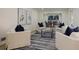 Spacious living room with comfortable seating and stylish rug at 605 Patrick Ne Pl, Sandy Springs, GA 30328