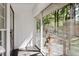 Enclosed porch that looks out to wooded yard at 605 Patrick Ne Pl, Sandy Springs, GA 30328