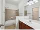Functional bathroom featuring a combined tub and shower, plus a vanity with ample counter space at 655 Mead Se St # 58, Atlanta, GA 30312