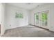 Neutral bedroom with carpet, natural light, and private balcony at 655 Mead Se St # 58, Atlanta, GA 30312