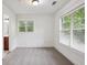 Bedroom showcasing large windows, neutral walls, and carpet at 655 Mead Se St # 58, Atlanta, GA 30312