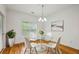Charming dining room bathed in natural light with a modern table setting for intimate meals at 655 Mead Se St # 58, Atlanta, GA 30312