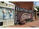 Exterior of a building with a mural advertising Grant Park Coffee and Coca-Cola at 655 Mead Se St # 58, Atlanta, GA 30312