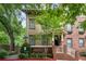 Charming townhome with brick and siding exterior, mature trees, and inviting front entrance at 655 Mead Se St # 58, Atlanta, GA 30312