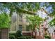 Two-story home with brick and siding exterior, manicured landscaping and a view of Mead Street at 655 Mead Se St # 58, Atlanta, GA 30312