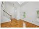 Bright, open space with hardwood floors, staircase, and lots of natural light at 655 Mead Se St # 58, Atlanta, GA 30312