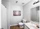 Bright bathroom features neutral paint and floors, tub and shower combination, and modern vanity at 902 Ashton Oak Cir, Stone Mountain, GA 30083
