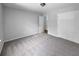 Spacious bedroom features neutral walls and carpet, and a double door closet at 902 Ashton Oak Cir, Stone Mountain, GA 30083