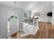 Inviting foyer with hardwood floors, a staircase, and views into the dining room at 902 Ashton Oak Cir, Stone Mountain, GA 30083