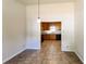 Cozy dining area adjacent to the kitchen with modern pendant lighting at 1465 Moriah Trce, Auburn, GA 30011