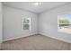 Bedroom featuring carpet flooring and natural light from a window at 3293 Lions Ruby Ln, Atlanta, GA 30349