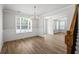 Spacious room boasting wood floors, crown molding, and plenty of natural light at 3293 Lions Ruby Ln, Atlanta, GA 30349