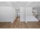 Bright living room with elegant wood flooring, crown molding, and natural light at 3293 Lions Ruby Ln, Atlanta, GA 30349
