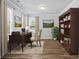 Home office featuring hardwood floors, natural light, and built-in shelving at 3293 Lions Ruby Ln, Atlanta, GA 30349