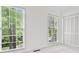 Bright bedroom featuring a closet, backyard views, and neutral walls at 475 Nottingham Dr, Marietta, GA 30066
