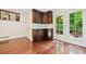 An eating area has a view to the outside and access to upper level at 475 Nottingham Dr, Marietta, GA 30066