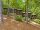 Spacious multi-level home with stone accents, set amongst mature trees at 475 Nottingham Dr, Marietta, GA 30066