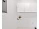 Clean laundry room with ample storage space and convenient utility connections at 475 Nottingham Dr, Marietta, GA 30066