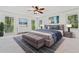 Bright and airy main bedroom suite featuring plush bedding and serene backyard views at 475 Nottingham Dr, Marietta, GA 30066