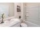 Bathroom featuring a bathtub and shower combo, decorated with modern accents at 2010 Vidalia Ct, Dacula, GA 30019