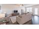 Bright living room boasts hardwood floors, neutral paint, and ample natural light at 2010 Vidalia Ct, Dacula, GA 30019