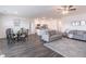 Spacious open-concept living space with stylish decor and a seamless flow between rooms at 2010 Vidalia Ct, Dacula, GA 30019