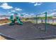 Community playground featuring modern play equipment, swings, and a safety-conscious rubber mulch surface at 2010 Vidalia Ct, Dacula, GA 30019